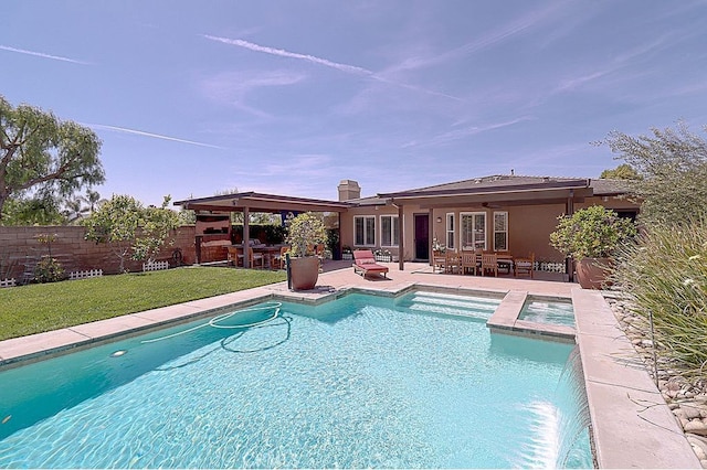 view of swimming pool with a patio, outdoor dry bar, ceiling fan, fence, and a yard