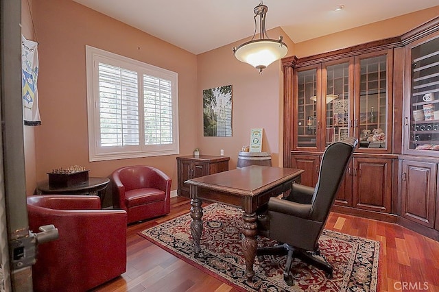 office space with light wood-style flooring