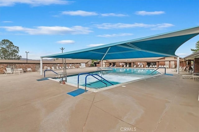 pool featuring a patio