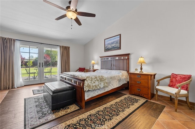 bedroom with ceiling fan, access to outside, tile patterned floors, vaulted ceiling, and french doors