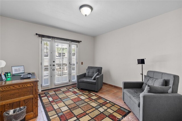 sitting room with light tile patterned floors