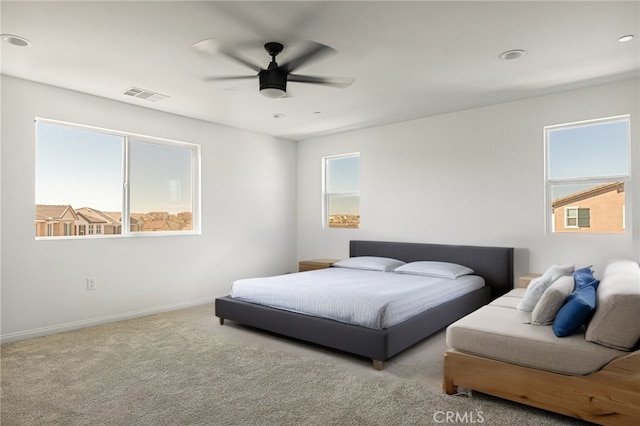 bedroom featuring visible vents, baseboards, carpet floors, recessed lighting, and a ceiling fan