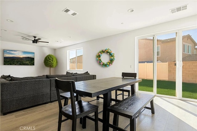 dining space with visible vents, recessed lighting, and light wood-style flooring