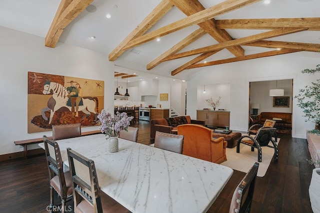 dining room with baseboards, wood finished floors, and beamed ceiling