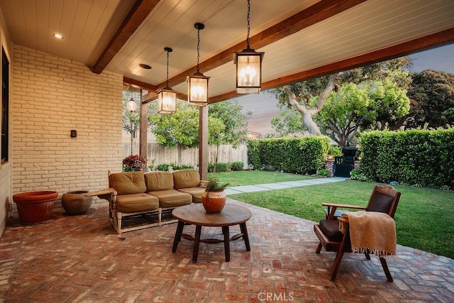 view of patio with an outdoor living space and a fenced backyard