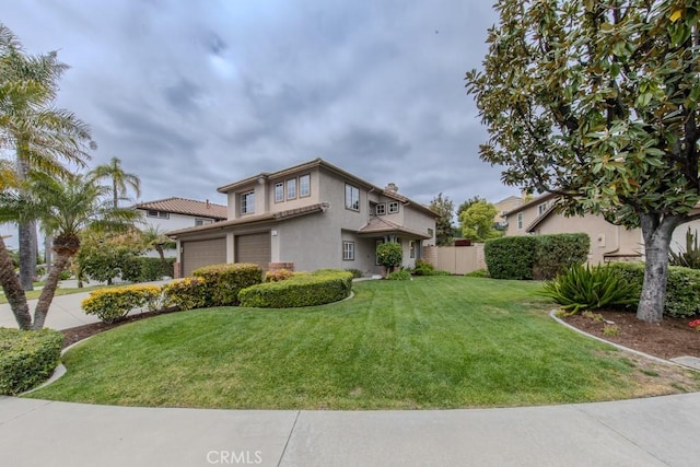 view of side of home with a garage, fence, stucco siding, a lawn, and driveway