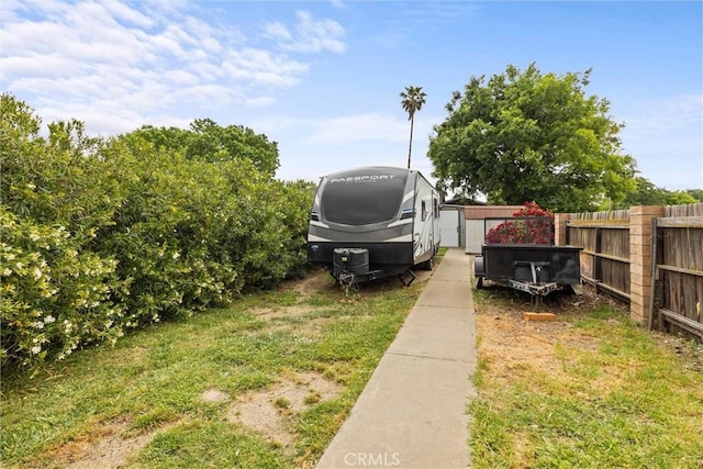 view of yard with fence