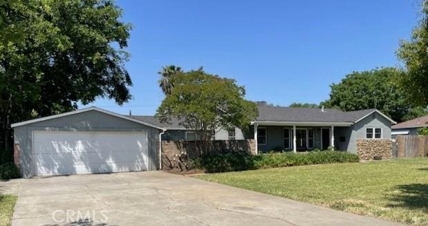 651 S Merrill Ave, Willows, CA 95988 - ranch-style home featuring concrete driveway and an attached garage