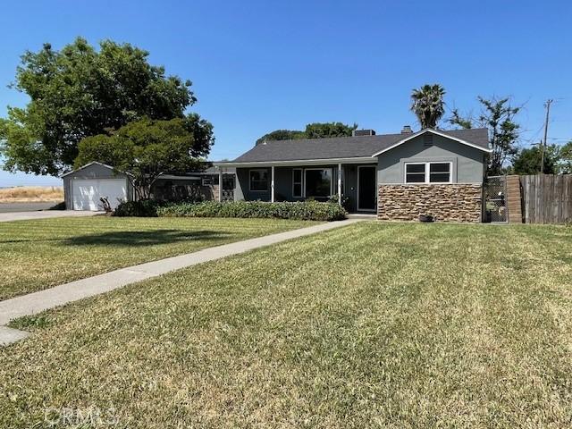 651 S Merrill Ave, Willows, CA 95988 - ranch-style home featuring stone siding and concrete driveway