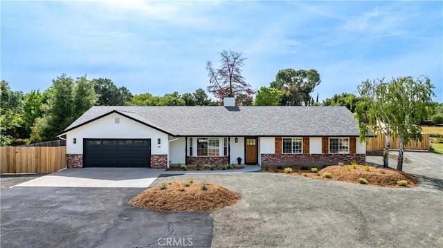40 Frontier Way, Templeton, CA 93465 - ranch-style house featuring a garage, a chimney, driveway, brick siding, and fence