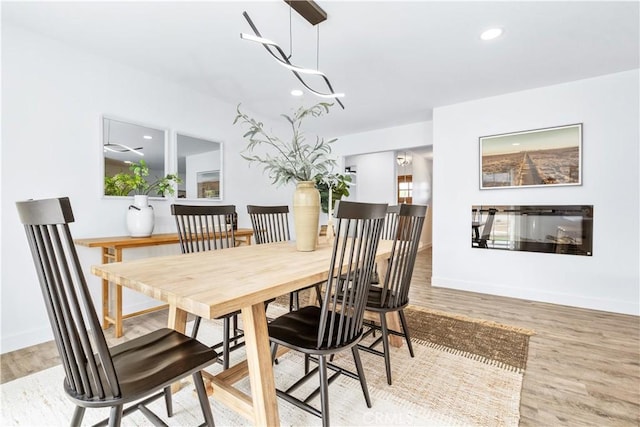 40 Frontier Way, Templeton, CA 93465 - dining room featuring baseboards, recessed lighting, wood finished floors, and an inviting chandelier