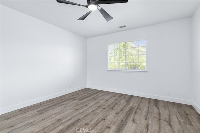 40 Frontier Way, Templeton, CA 93465 - empty room featuring baseboards, visible vents, wood finished floors, and ceiling fan
