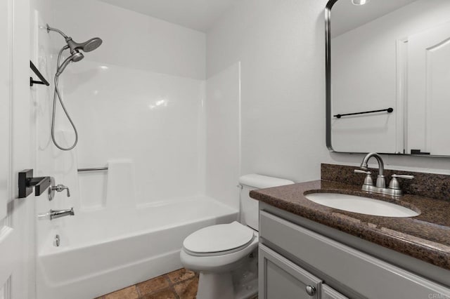 full bath featuring toilet, shower / washtub combination, and vanity