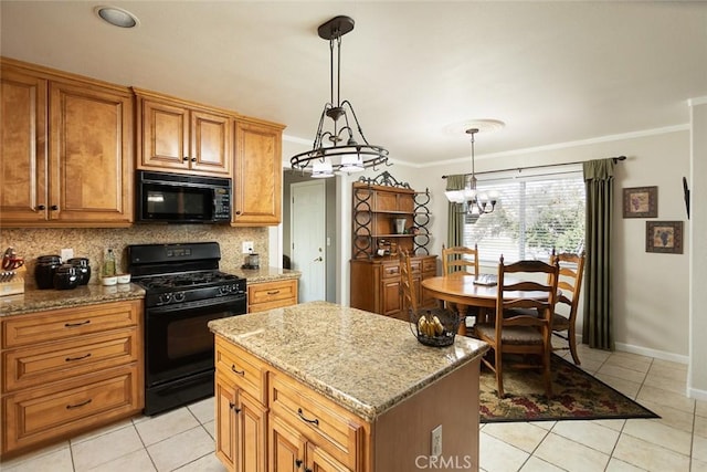kitchen featuring an inviting chandelier, light stone counters, black appliances, backsplash, and light tile patterned flooring