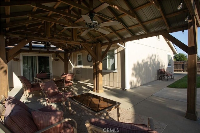 view of patio / terrace with fence, outdoor dining space, a gazebo, and ceiling fan