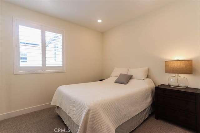 carpeted bedroom featuring recessed lighting and baseboards