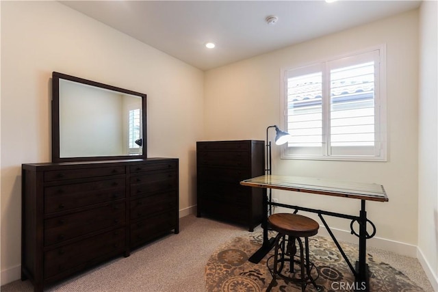 office space featuring baseboards, recessed lighting, and light colored carpet