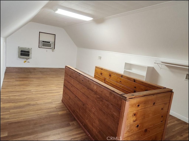 8581 Montara Rd, Pinon Hills, CA 92372 - additional living space featuring lofted ceiling, baseboards, heating unit, wood finished floors, and cooling unit