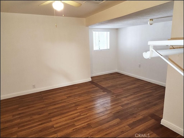8581 Montara Rd, Pinon Hills, CA 92372 - basement with a ceiling fan, hardwood / wood-style flooring, and baseboards