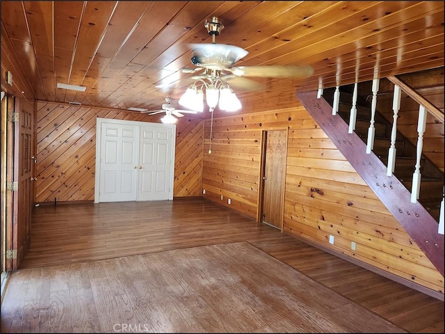 8581 Montara Rd, Pinon Hills, CA 92372 - bonus room featuring wooden walls, ceiling fan, hardwood / wood-style floors, and stairway