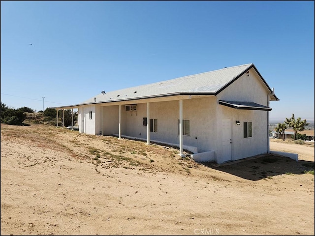 8581 Montara Rd, Pinon Hills, CA 92372 - back of property featuring stucco siding