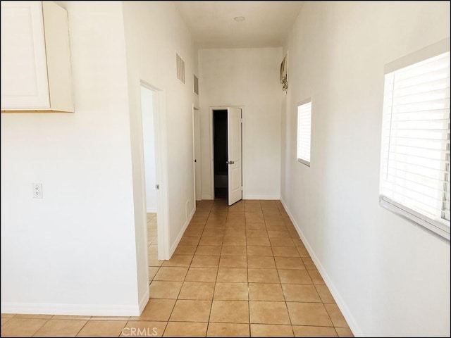 8581 Montara Rd, Pinon Hills, CA 92372 - hallway featuring baseboards, visible vents, and light tile patterned flooring