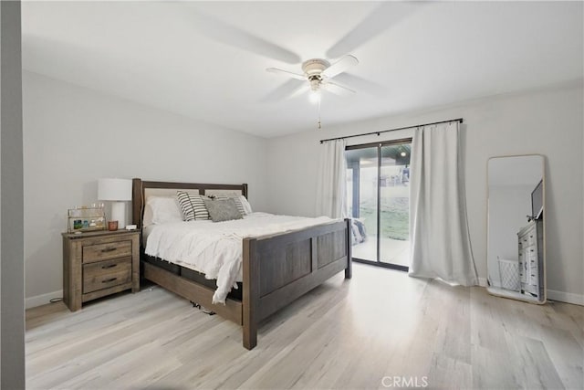 bedroom featuring access to exterior, ceiling fan, baseboards, and light wood-type flooring