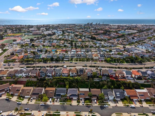 aerial view featuring a residential view and a water view