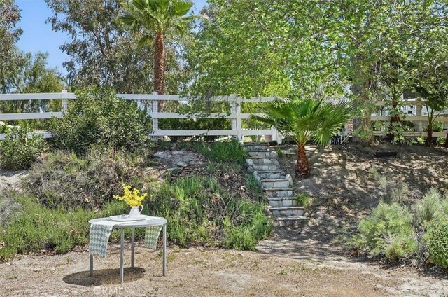 view of yard featuring fence