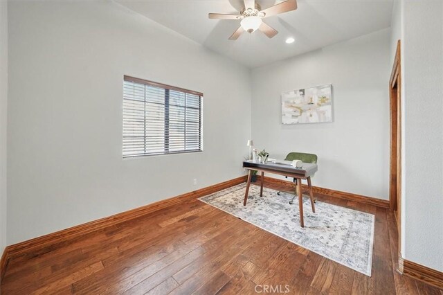 home office featuring ceiling fan, hardwood / wood-style flooring, recessed lighting, and baseboards