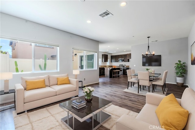 217 Oberlander Way, Fallbrook, CA 92028 - living room featuring recessed lighting, wood finished floors, a chandelier, and baseboards