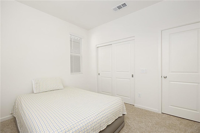 36225 Beacon Light Way, Wildomar, CA 92595 - carpeted bedroom with baseboards, a closet, and visible vents