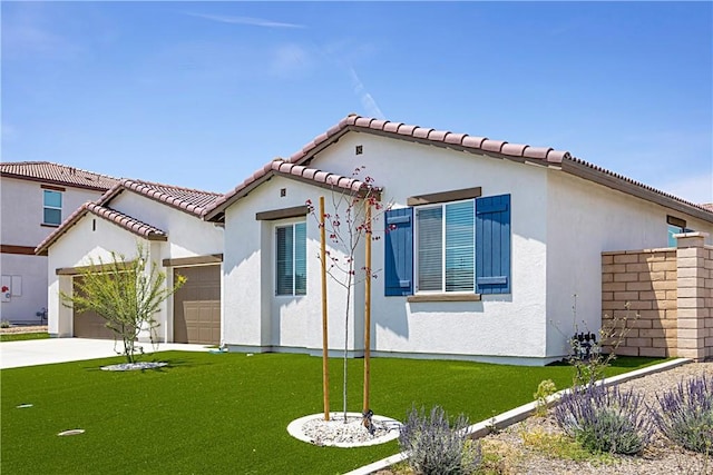 36225 Beacon Light Way, Wildomar, CA 92595 - mediterranean / spanish house with concrete driveway, a front yard, stucco siding, and an attached garage