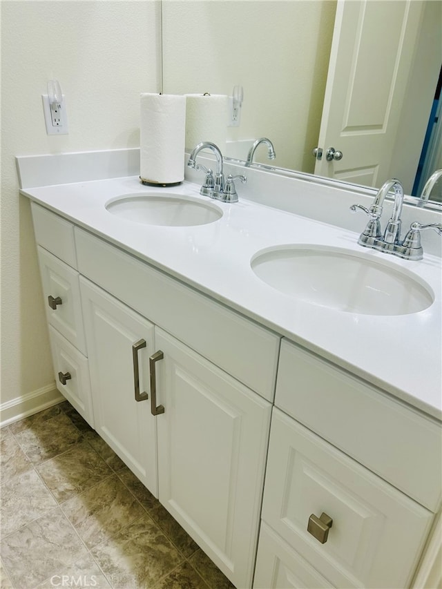 36225 Beacon Light Way, Wildomar, CA 92595 - bathroom with a sink, double vanity, and baseboards