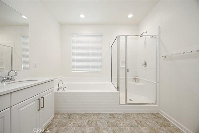 36225 Beacon Light Way, Wildomar, CA 92595 - bathroom with vanity, a garden tub, and a shower stall