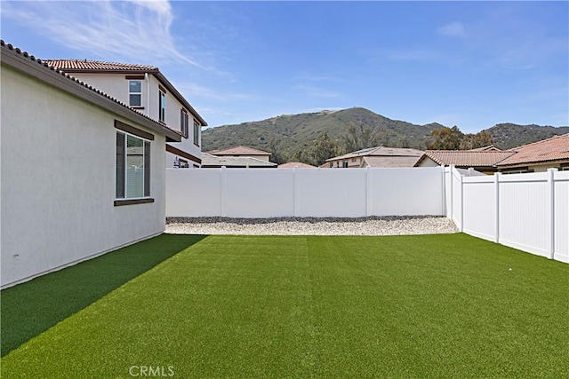 36225 Beacon Light Way, Wildomar, CA 92595 - view of yard with a fenced backyard and a mountain view
