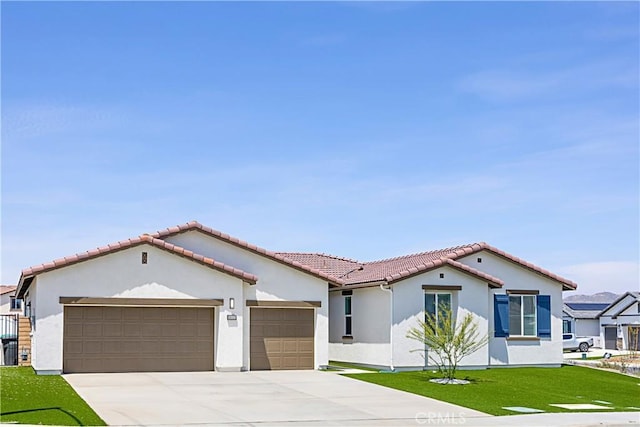 36225 Beacon Light Way, Wildomar, CA 92595 - mediterranean / spanish house featuring driveway, a garage, stucco siding, a tile roof, and a front yard