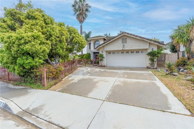 22527 Mountain View Rd, Moreno Valley, CA 92557 - view of front of property featuring fence, an attached garage, stucco siding, and concrete driveway