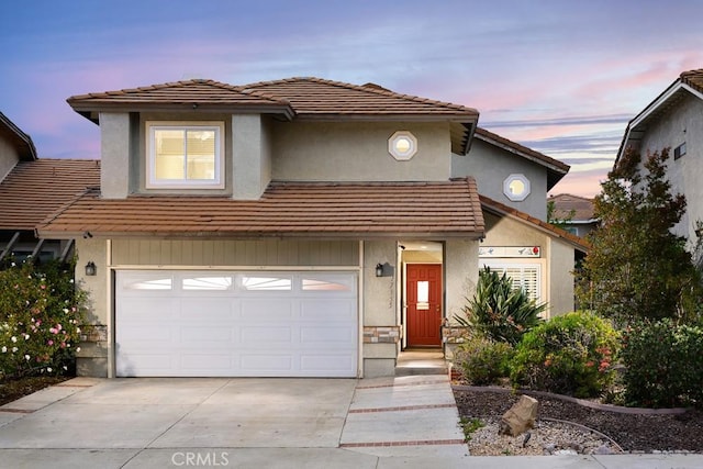 17355 Ridgedale Ln, Yorba Linda, CA 92886 - traditional-style house featuring driveway, stucco siding, an attached garage, and a tile roof