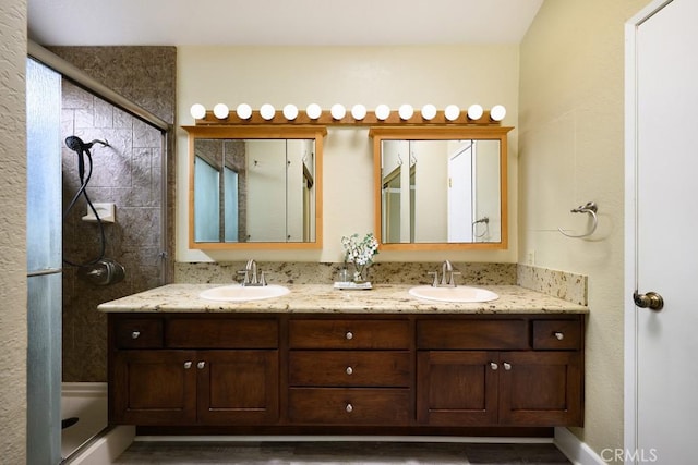 17355 Ridgedale Ln, Yorba Linda, CA 92886 - bathroom featuring a stall shower, wood finished floors, and a sink