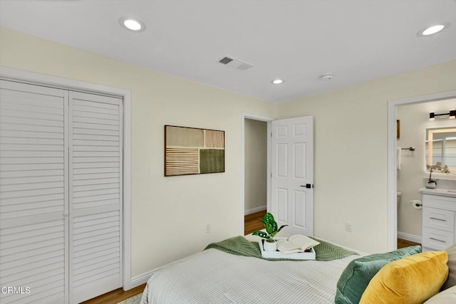 17632 E Covina Blvd, Covina, CA 91722 - bedroom featuring recessed lighting, a closet, connected bathroom, and wood finished floors