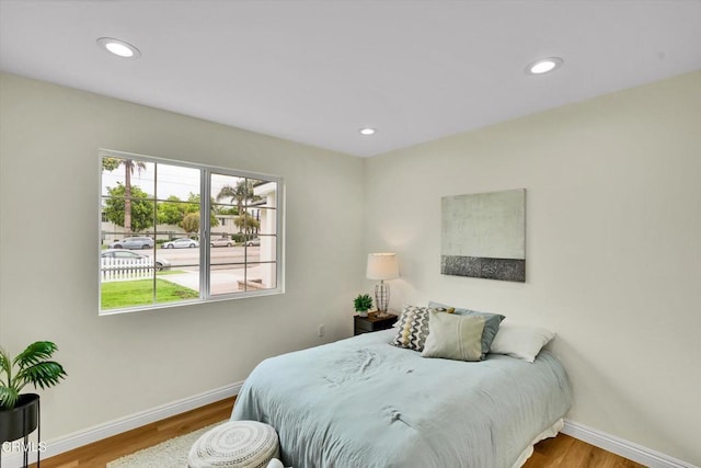 17632 E Covina Blvd, Covina, CA 91722 - bedroom featuring multiple windows, wood finished floors, and recessed lighting