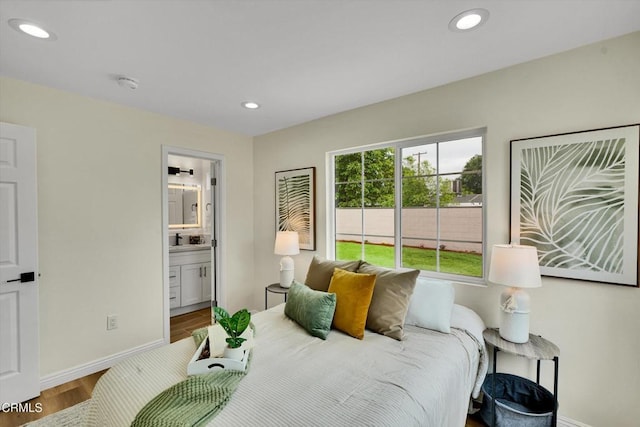 17632 E Covina Blvd, Covina, CA 91722 - bedroom with wood finished floors, recessed lighting, and ensuite bathroom