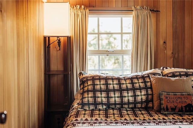 879 Orange Ave, Sugarloaf, CA 92386 - bedroom featuring wood walls and multiple windows