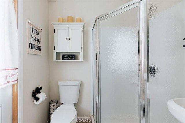 879 Orange Ave, Sugarloaf, CA 92386 - bathroom featuring toilet and a shower stall