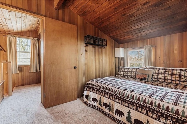 879 Orange Ave, Sugarloaf, CA 92386 - bedroom featuring wooden walls, light colored carpet, and lofted ceiling