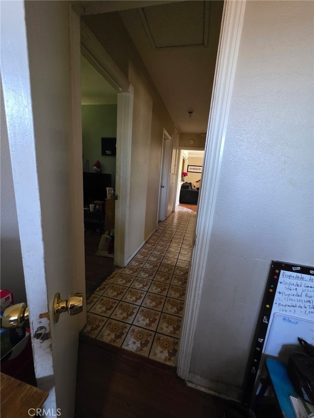 hall featuring tile patterned floors