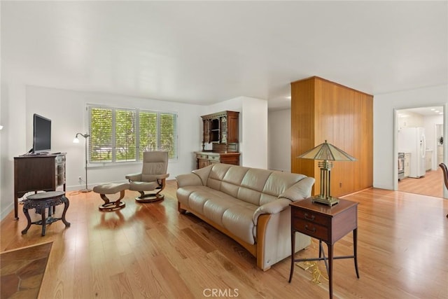 1273 E 7th St, Chico, CA 95928 - living area with light wood-type flooring and baseboards
