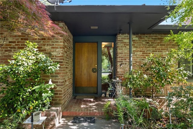 1273 E 7th St, Chico, CA 95928 - view of exterior entry featuring brick siding