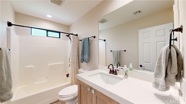 bathroom featuring shower / bath combo, visible vents, toilet, and vanity